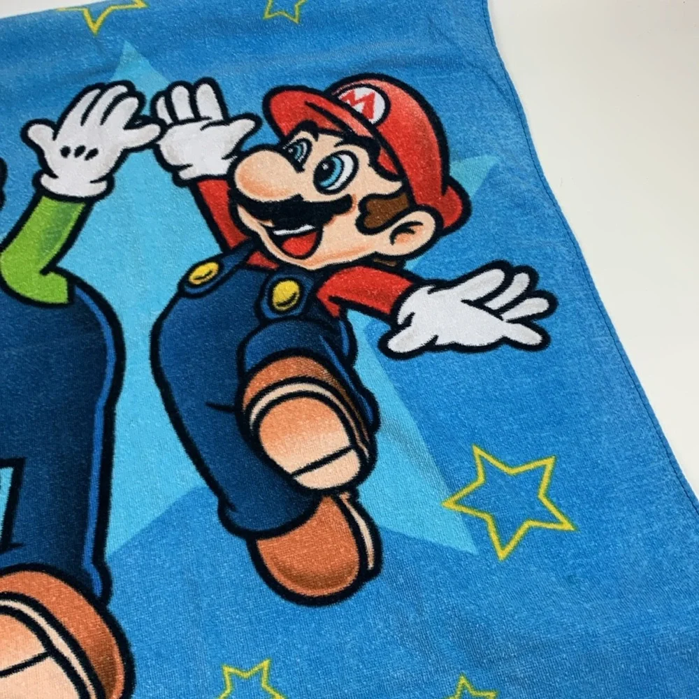 Nintendo Super Mario Bros colorful Blue Beach Towel Video game towel 27x52”